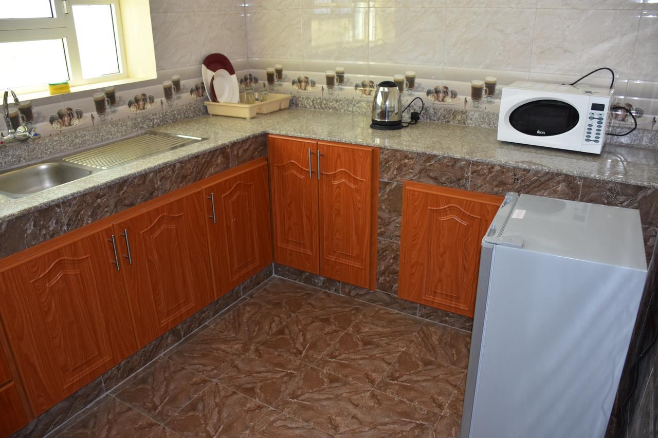 Green Mountain Hotel Apartments Al 'Aqar Экстерьер фото